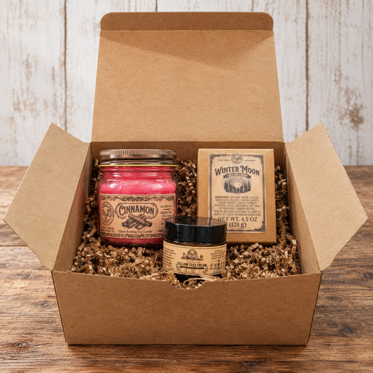 Holiday Gift Box: soy candle, winter goat's milk soap and tallow face cream in a kraft gift box