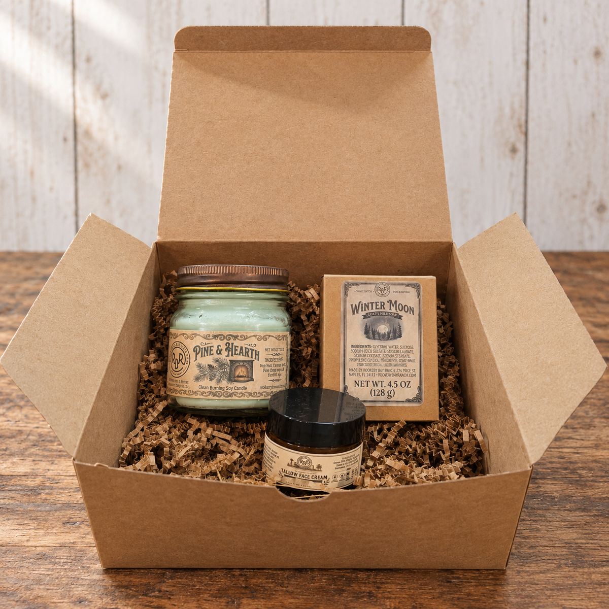 Holiday Gift Box with a winter soy candle, goat's milk soap and tallow face cream